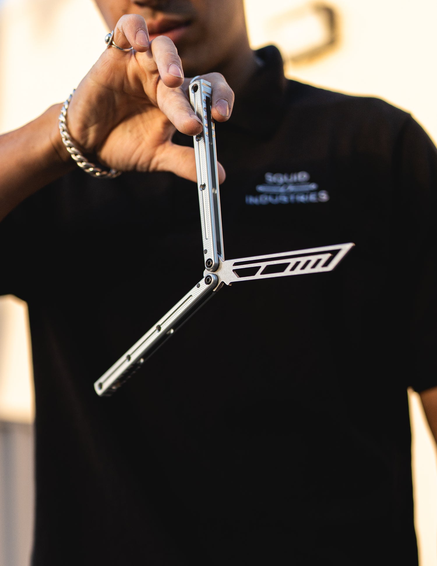 andre holding a silver krake raken trainer
