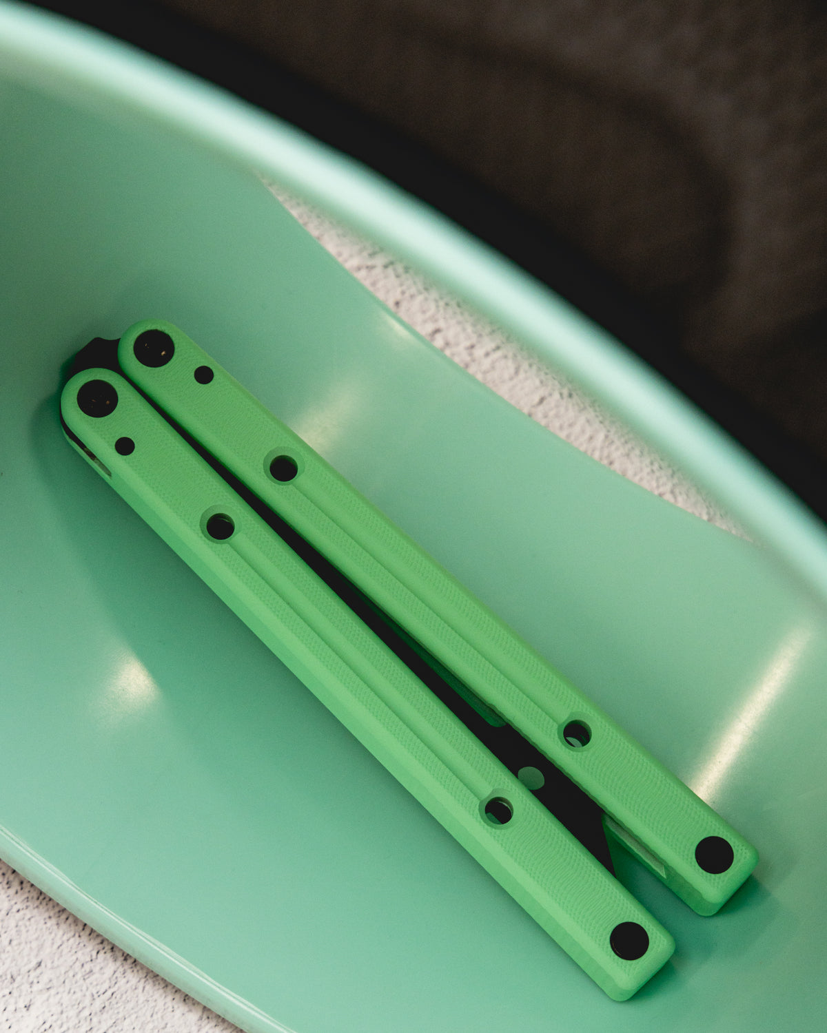Mint Squidtrainer on green surface