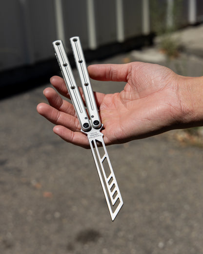 Flow Channel Krake Raken Trainer Open position upside down on a hand