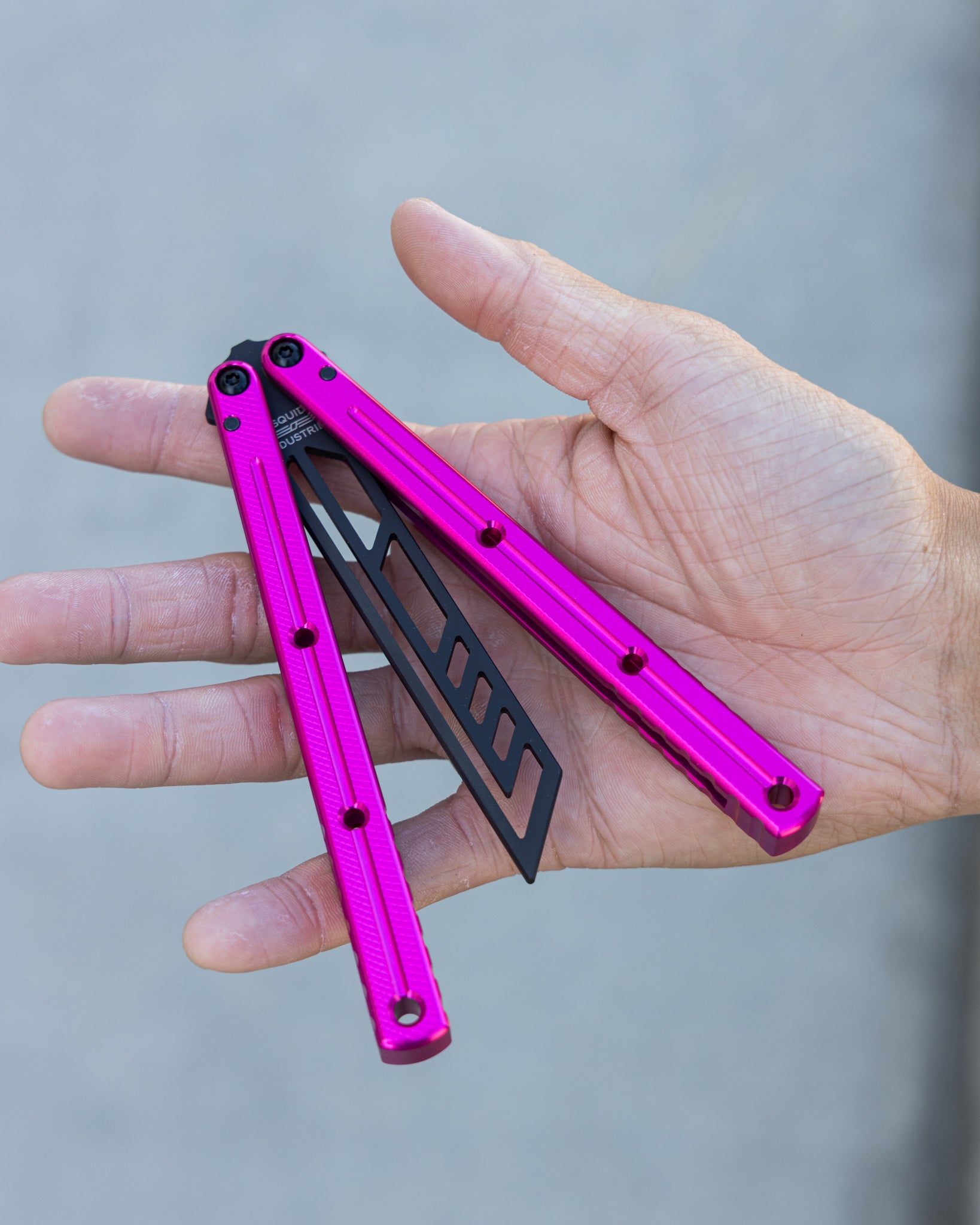Inked Hot Pink krake Raken Half Open Position On Hand