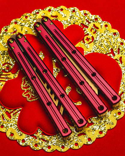 Lunar new year krake raken trainer side by side on red and gold decorative 