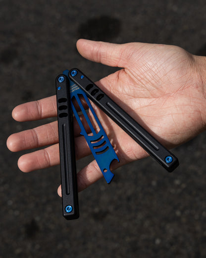 Sapphire Mako V5 Blue and Black in Semi Close Position on a hand