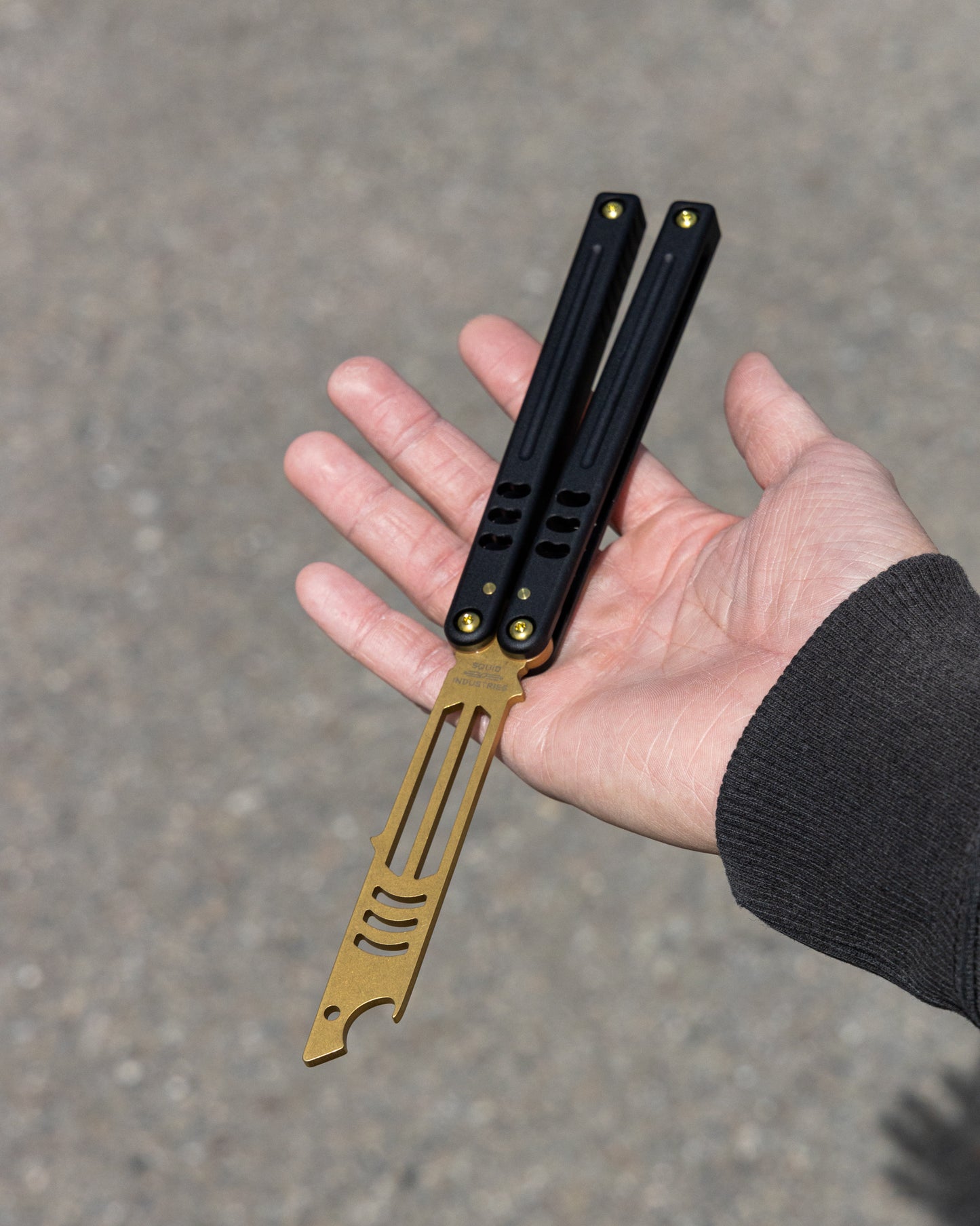 Topaz Mako V5 open position on hand blur background