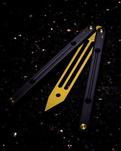 Topaz Squidtrainer Semi Open On Black and Gold Background