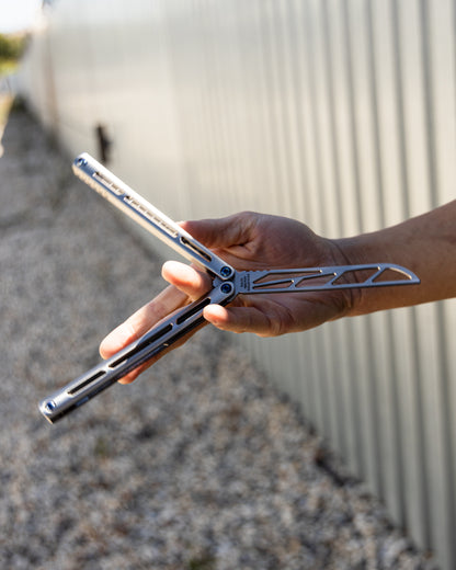 Tsunami trainer being flip on hand 