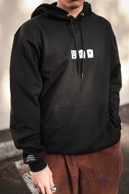 A man wearing a black Squiddy Squad Embroidered Champion Brand Hoodie